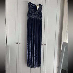 Amazing beaded navy blue maternity dress, perfect for any season.